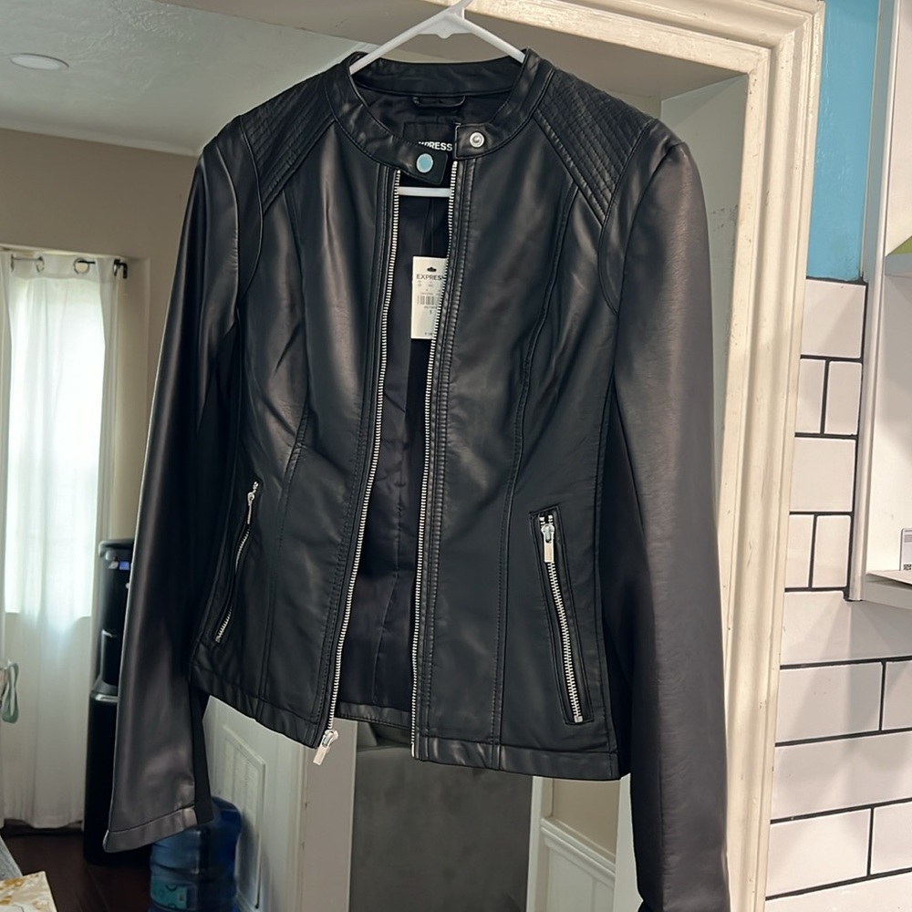 Beautiful Express Leather jacket in black size small brand new with tags